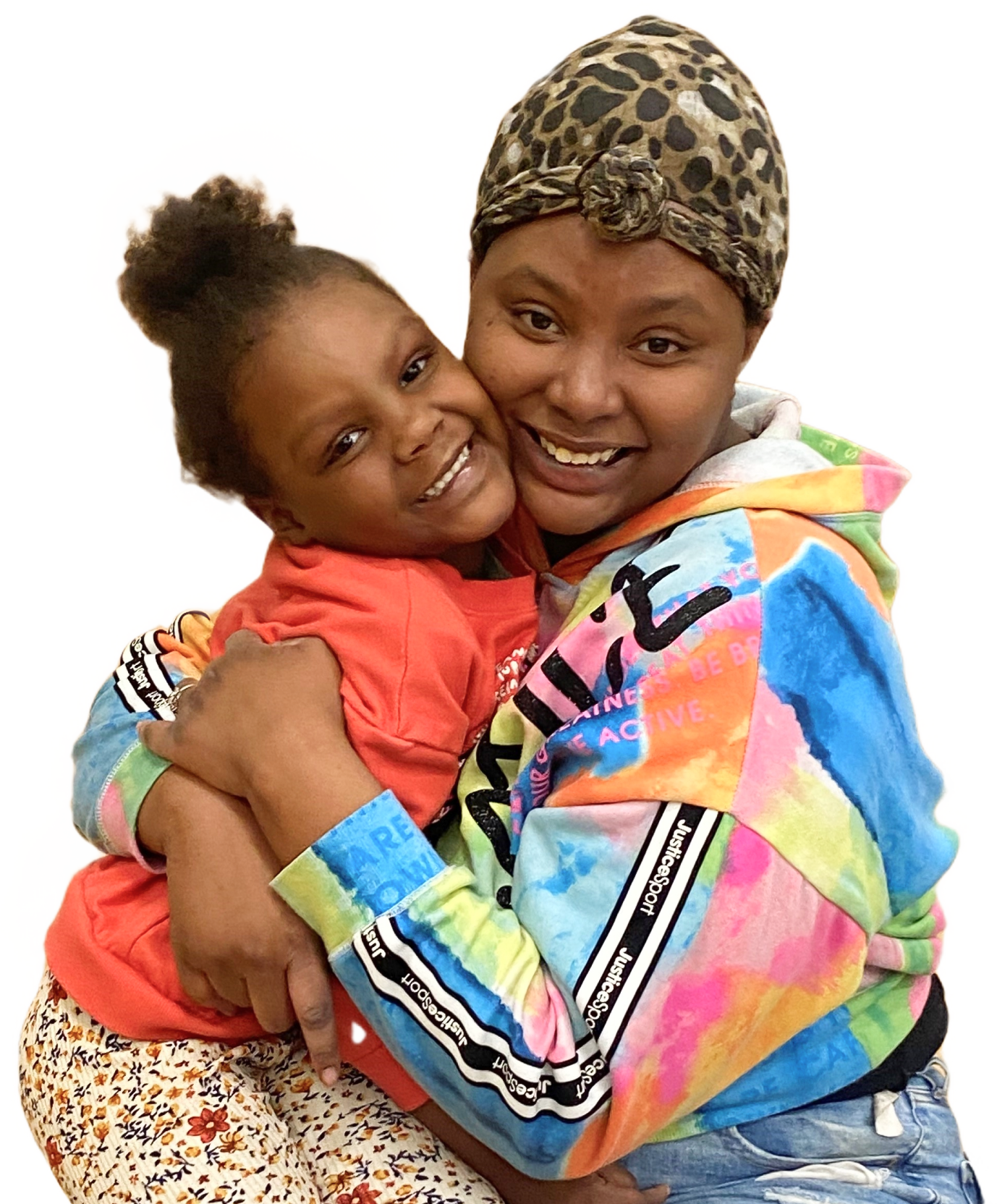 Smiling mother and daughter embracing happily
